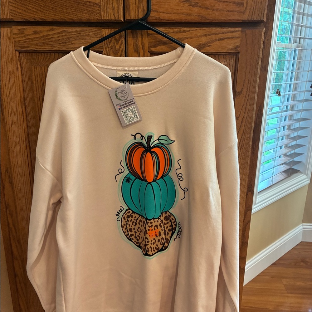 Cream Sweatshirt with Orange & Teal Pumpkin Stack Graphic